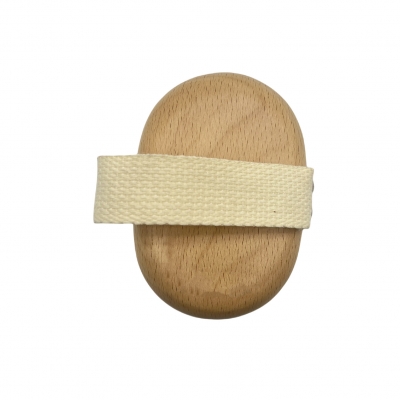 Hand grabbing oval bath brush